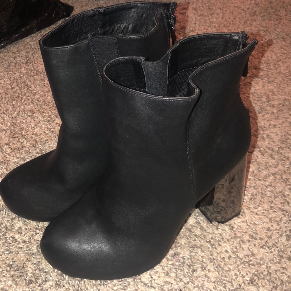 Torrid black bottles with geometric metal heel